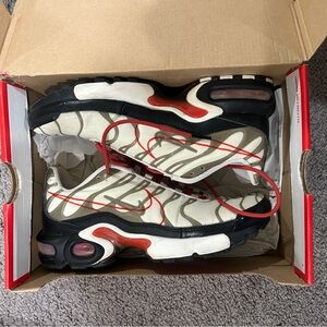 Nike Air Max Plus "Script Swoosh" edition
- Black, White, Red